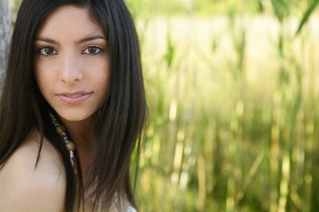 Wall Mural - Portrait of beautiful indian woman on nature