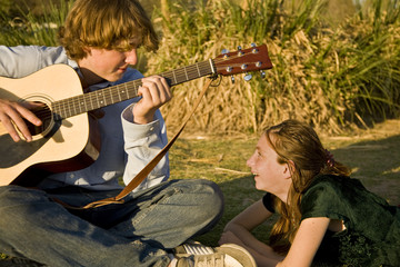 Brother and Sister playing music