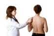 © zzzdim - Doctor assessing patient by stethoscope