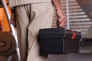 Man holding tool box