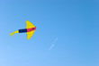 Kite against two flying planes