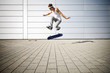 © sint - skater making a flip with his skateboard