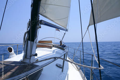 Obraz w ramie Sailing with an old sailboat over mediterranean sea