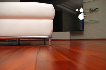 Sofa on wooden floor