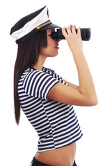 Wall Mural - Woman looking through binoculars isolated on white