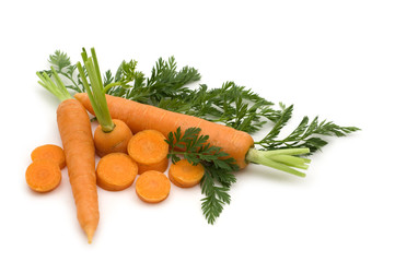 Wall Mural - slice fresh carrots on white background