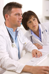 Wall Mural - Doctors working at office