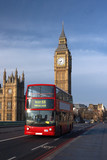 Fototapeta Londyn - Houses of Parliament with red bus in London