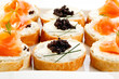 Mini sandwiches - bagel with cream cheese,  salmon, caviar