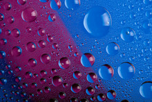 Blue And Pink Water Drops Background