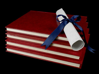 diploma over books