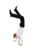 © pikselstock - Businessman doing handstand
