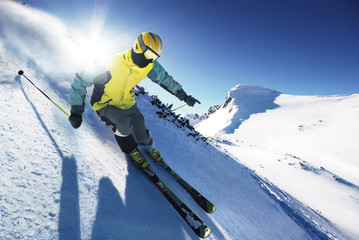 Wall Mural - Skier in high mountains