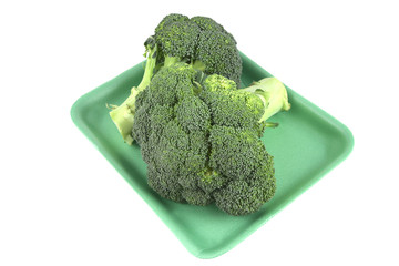 two green fresh raw broccoli