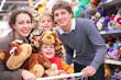 © Pavel Losevsky - Family in shop with soft toys
