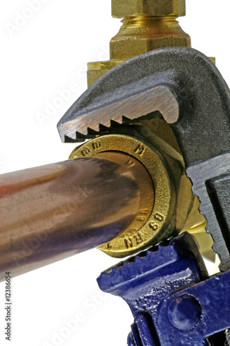 close up wrench on gate valve - Buy this stock photo and explore