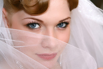 Young beautiful bride with red hair