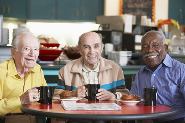 Wall Mural - Senior men drinking tea together