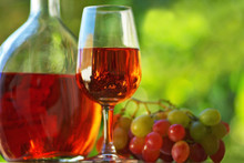 Portuguese Rose Wine And Grapes.