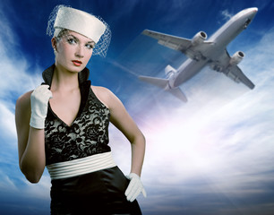 Wall Mural - Sexy stewardess and flying plane