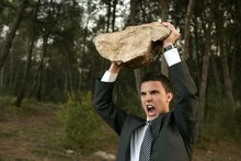 Angry Businessman Outdoor, Big Stone In Hands