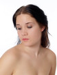 © jeffwqc - Young woman with bare shoulders portrait looking down