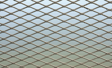 Rombic gray metal grid