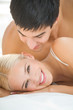 © vgstudio - Young attractive happy amorous couple at bedroom