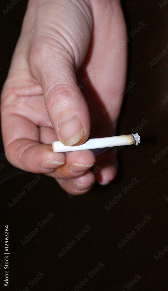 cigarette finger stains Nicotine stained fingers Stock Photo