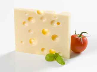 Canvas Print - Slice of hard cheese and a tomato