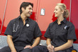 © Monkey Business - Two paramedics laughing together