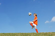 © godfer - kid or boy playing soccer or football