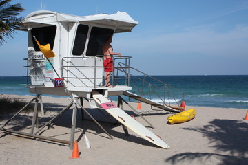 Poster - a lifeguard stand at the beach