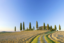 A Typical Tuscan Landscape In Italy With A Tuscan Villa