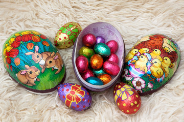 Wall Mural - easter eggs on sheepskin