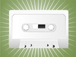 Realistic Cassette Tape Vector on green background.