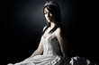 Shot of a Young Bride against grey background