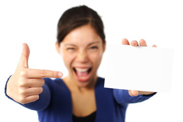 Wall Mural - Woman holding blank card / white sign