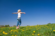 © kubais - happy young woman on meadow