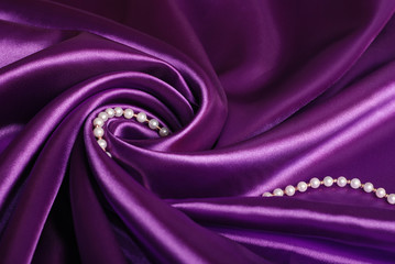 Jewels on purple satin