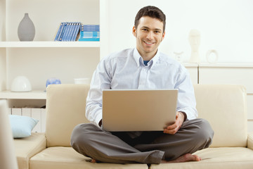 Poster - Young man working at home