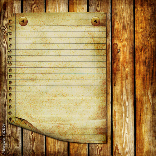 vintage blank page over wooden planks