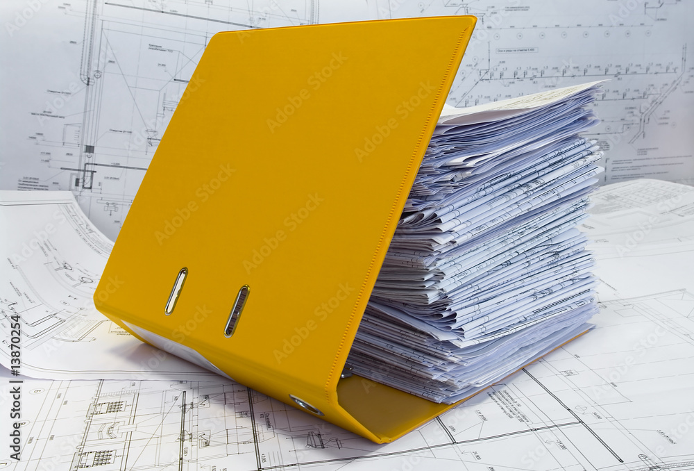Heap of design and project drawings in yellow folder. Stock Photo ...