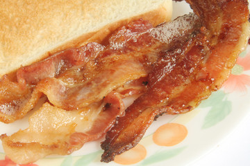 Wall Mural - Crispy Streaked Bacon with Toast Bread