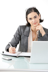 Canvas Print - Businesswoman working at desk