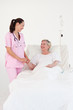 © WavebreakMediaMicro - Nurse with an elderly patient