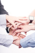 Hands of a successful business team on a white background