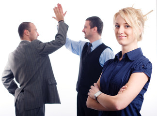 Business team - smiling woman and two happy business men