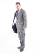 © Andreea Ardelean - Young businessman with a laptop bag isolated on white