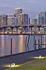 Wall Mural - Miami buildings and bridge after sunset